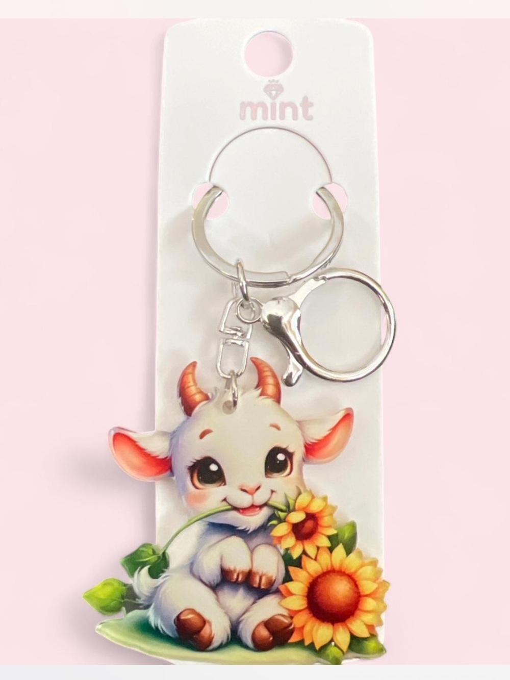 Mint.Keychain and Bag Charm with White Goat and Yellow Sunflowers in Silver Tone